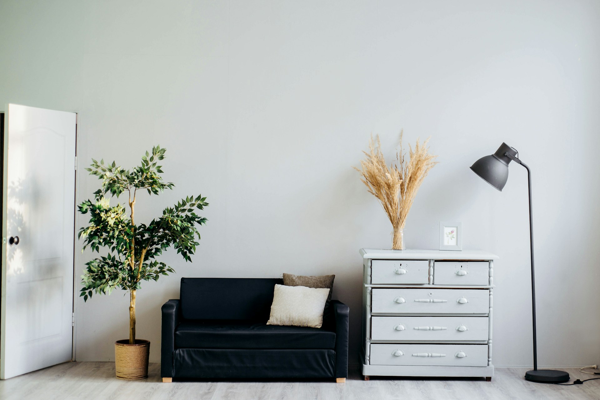 Window with blinds half open at night, suggesting late evening home viewing